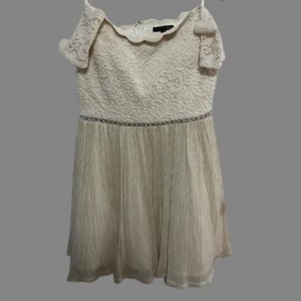 Off the shoulder white dress.